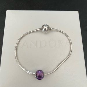 Pandora sterling silver snake chain bracelet with purple charm.